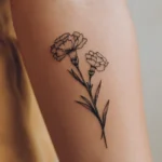January birth flower tattoo design: minimalist fine-line illustration of carnation and snowdrop flowers intertwined, black ink botanical art on cream background